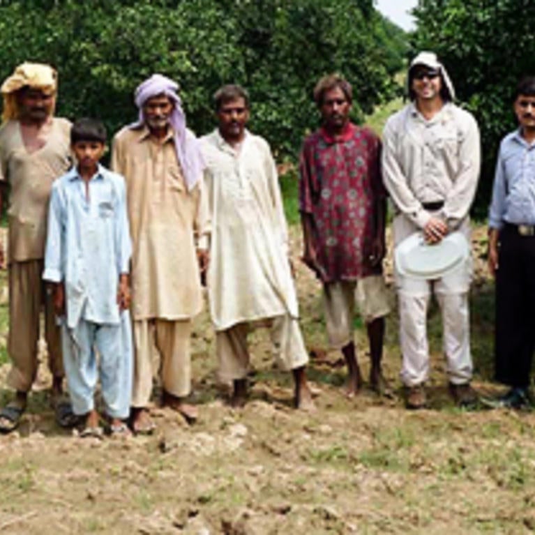 Farmers, the Punjabi Elite Commandos, Students from the University of Agriculture at Faisalabad, and Mark Hoddle looking for Asian citrus psyllid