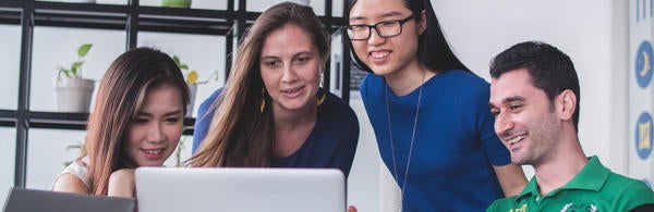 Students around Laptop