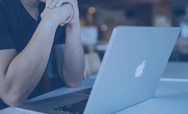 watching a video on a laptop (c) unsplash